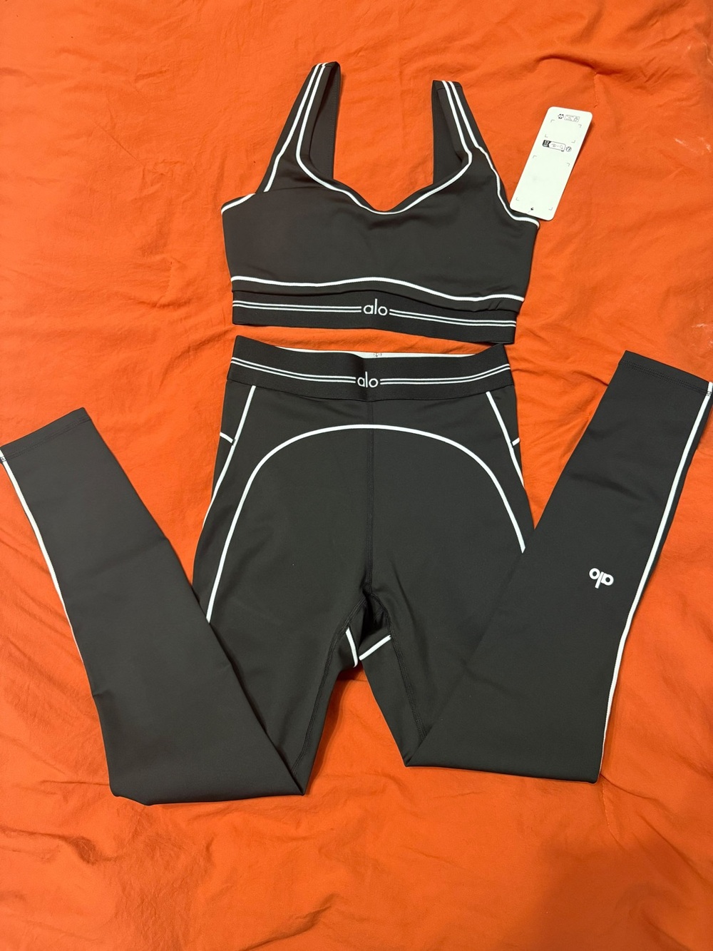 ALO Yoga Black Sports Bra with White Piping